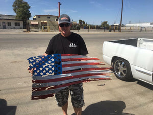 Metal U.S. Tattered American Flag - Dragonslayer Industries LLC Displayed by it's proud veteran owner